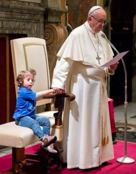 This image has an empty alt attribute; its file name is pope-francis-girl-with-down-syndrome-1.png